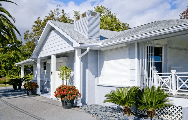 White bungalow with garden